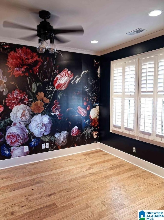 interior space with ceiling fan and hardwood / wood-style floors