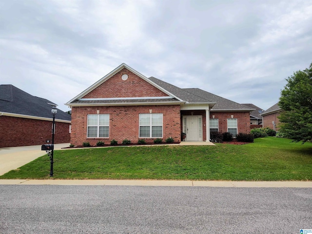 view of front of property with a front lawn