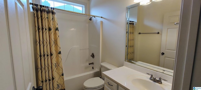 full bathroom featuring vanity, toilet, and shower / tub combo