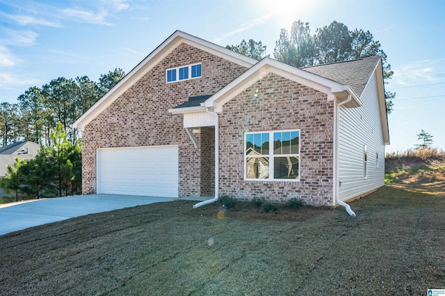 view of front facade featuring a garage and a front lawn