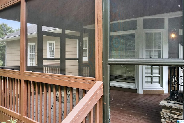 wooden terrace with a sunroom