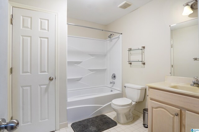 full bathroom featuring shower / bathtub combination, tile patterned floors, toilet, and vanity