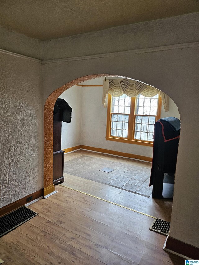 unfurnished room featuring light wood-type flooring