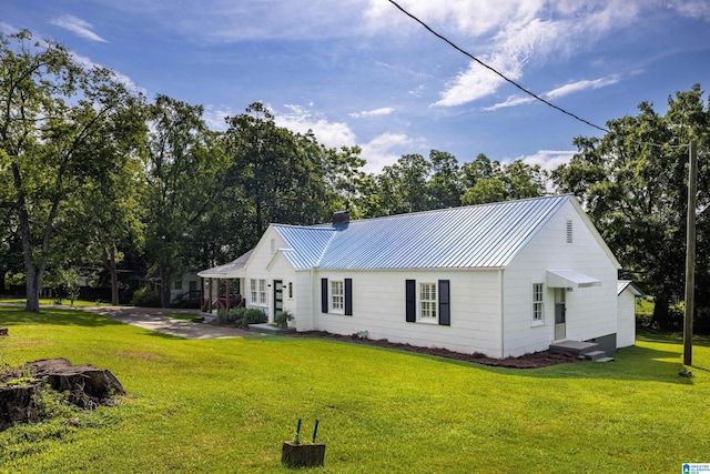 exterior space with a yard