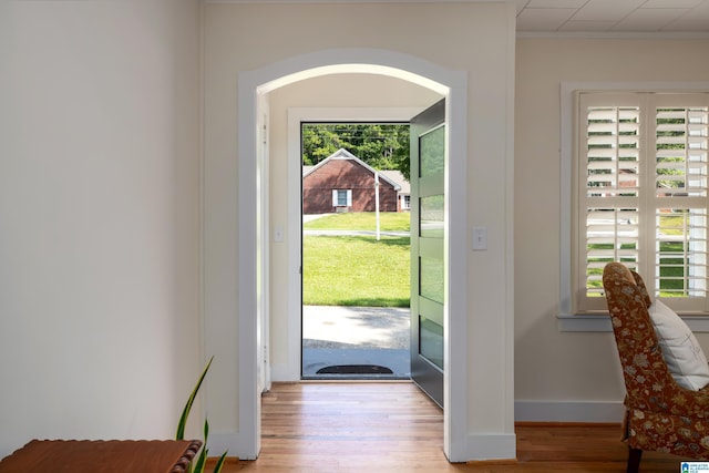 doorway to outside with light hardwood / wood-style floors