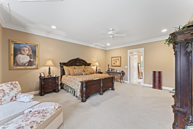 carpeted bedroom featuring crown molding and ceiling fan
