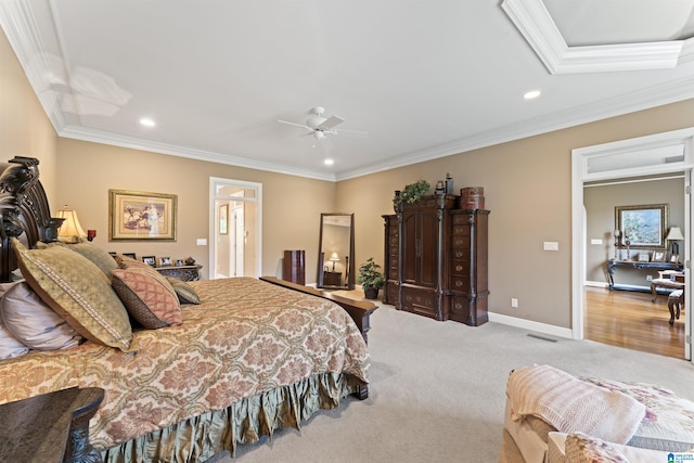 bedroom featuring carpet floors, ornamental molding, and ceiling fan