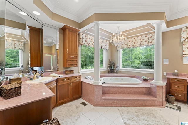 bathroom with vanity, a notable chandelier, crown molding, and ornate columns