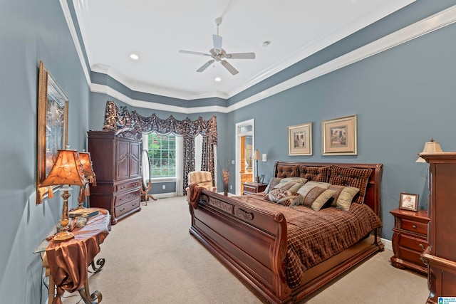 carpeted bedroom featuring ceiling fan, connected bathroom, and ornamental molding