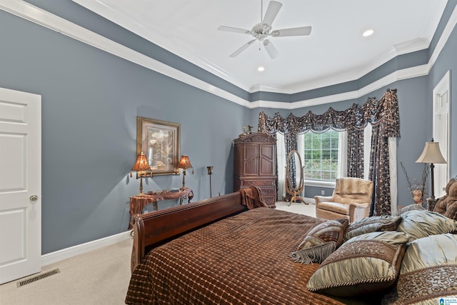 bedroom with ornamental molding, carpet flooring, and ceiling fan