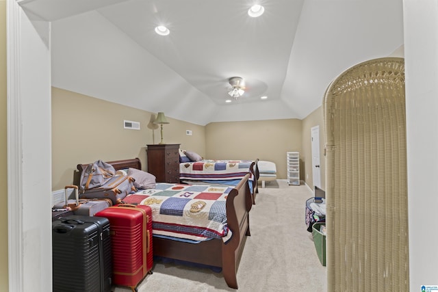 carpeted bedroom with vaulted ceiling