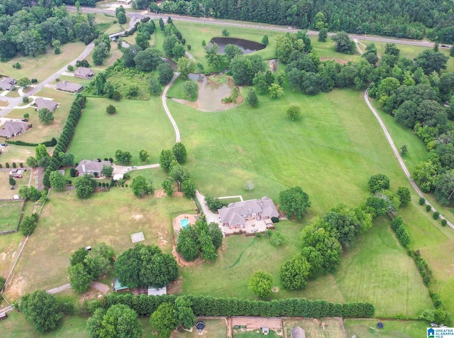 birds eye view of property featuring a rural view