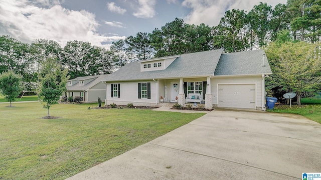 view of front of home featuring a garage and a front yard