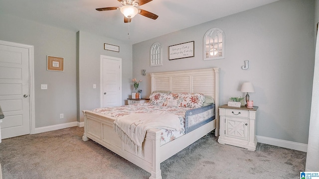 carpeted bedroom featuring ceiling fan