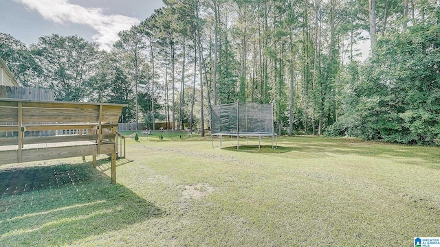 view of yard featuring a trampoline