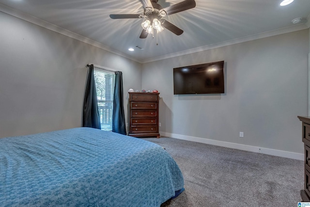 carpeted bedroom with ornamental molding and ceiling fan