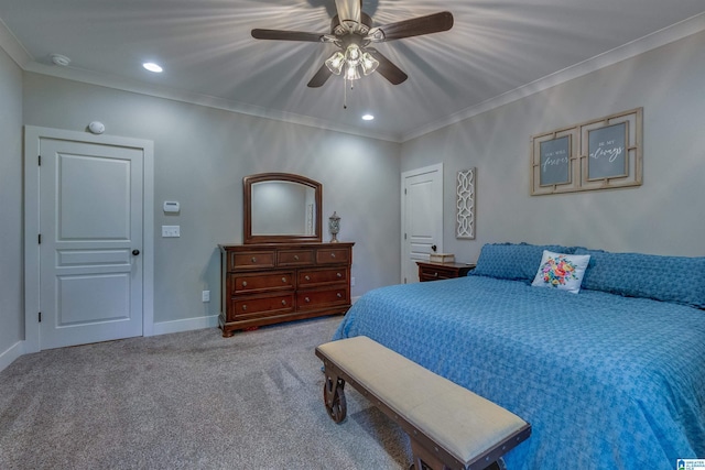 carpeted bedroom featuring crown molding and ceiling fan