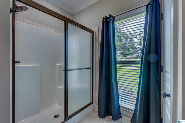 bathroom featuring walk in shower and tile patterned floors