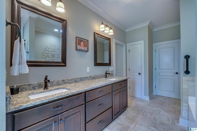 bathroom featuring vanity and crown molding