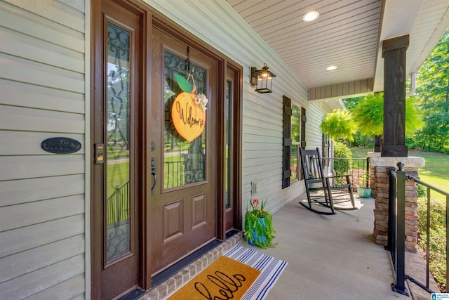 doorway to property with a porch