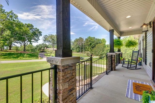 balcony featuring a porch