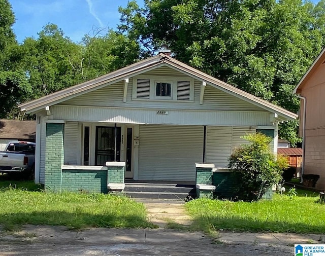 bungalow-style home with covered porch