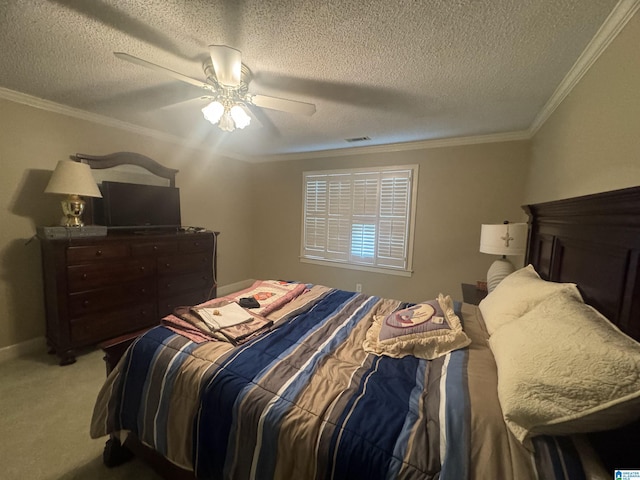 carpeted bedroom with ceiling fan, a textured ceiling, and crown molding
