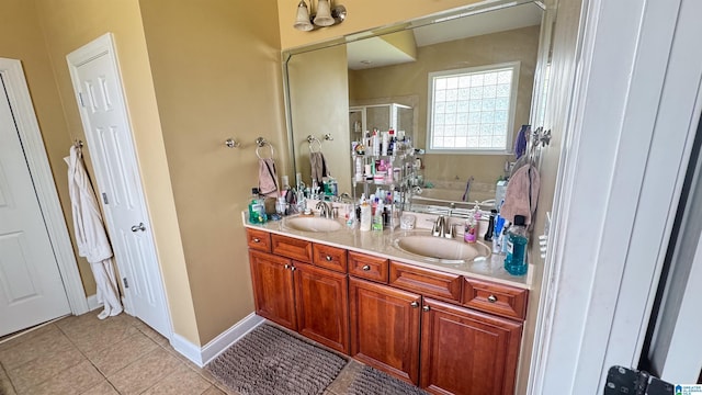 bathroom featuring vanity, independent shower and bath, and tile patterned flooring