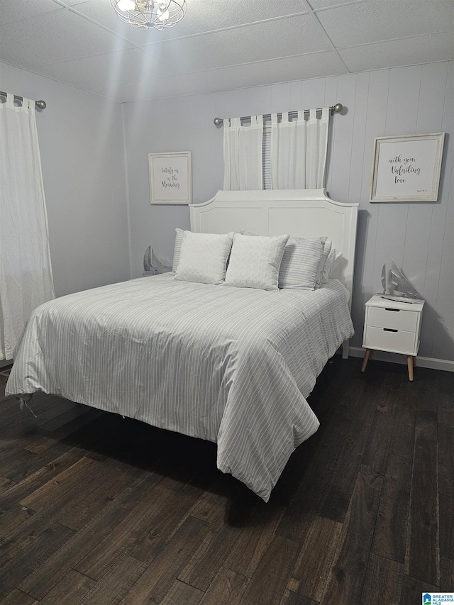 bedroom featuring dark wood-type flooring