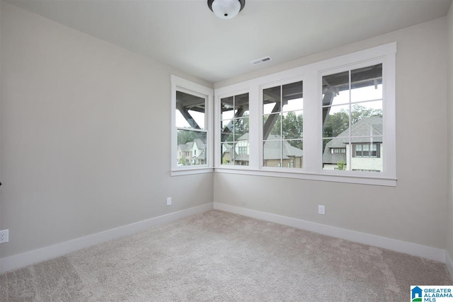 view of carpeted spare room