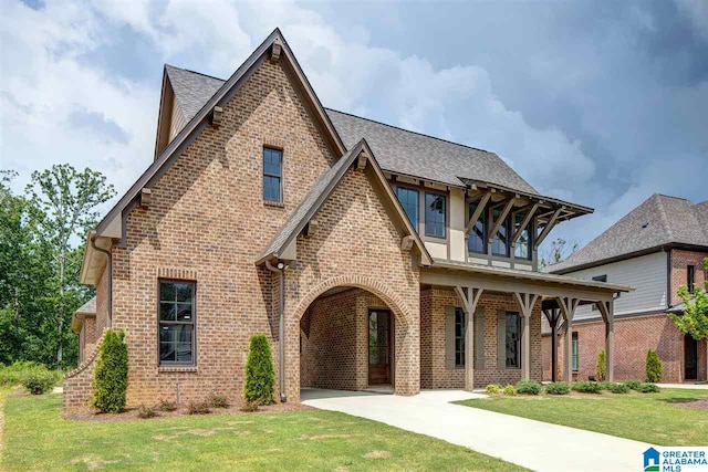 tudor house with a front yard