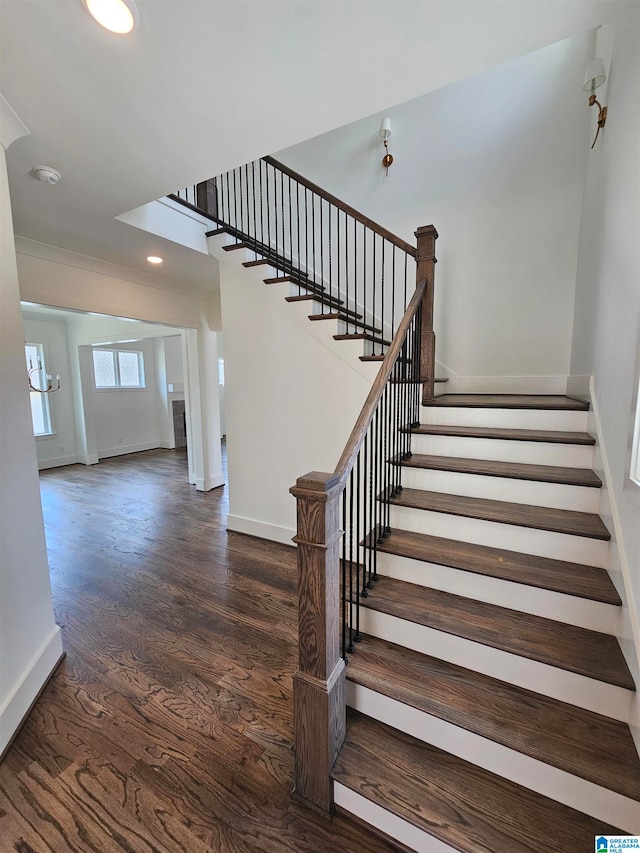 staircase featuring hardwood / wood-style floors