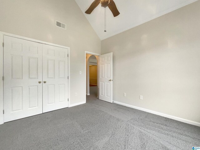 bathroom with vaulted ceiling, wood-type flooring, toilet, and double sink vanity