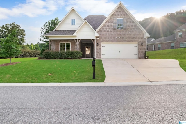 view of front facade with a garage and a front lawn