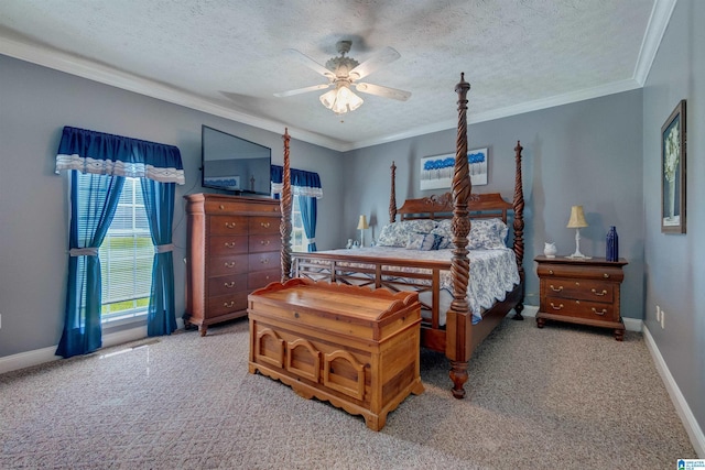 bedroom with crown molding, ceiling fan, carpet flooring, and a textured ceiling