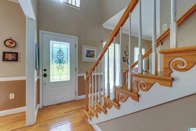 entryway with light hardwood / wood-style flooring