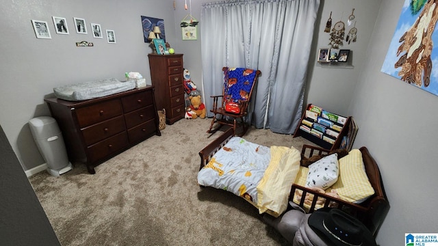 bedroom with light colored carpet