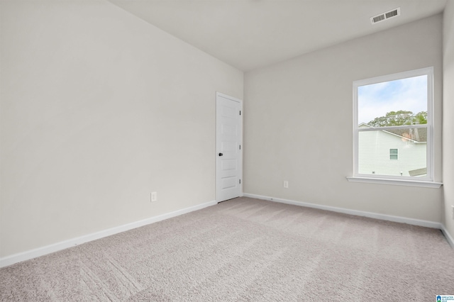 spare room featuring carpet flooring