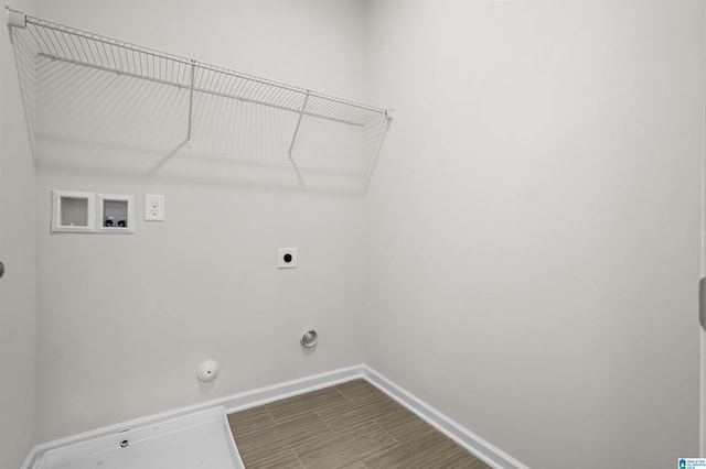 laundry room with gas dryer hookup, washer hookup, hookup for an electric dryer, and hardwood / wood-style flooring