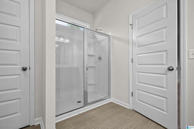 bathroom with an enclosed shower