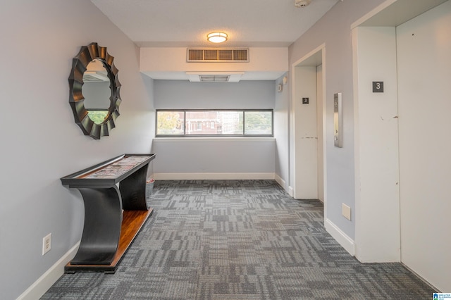 corridor featuring carpet