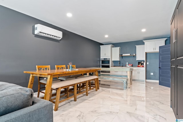 dining room featuring a wall unit AC