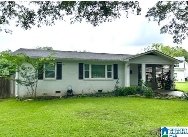 ranch-style home with a front yard