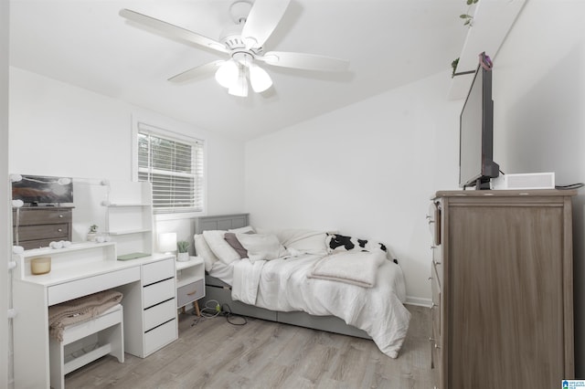 bedroom featuring ceiling fan and light wood-type flooring