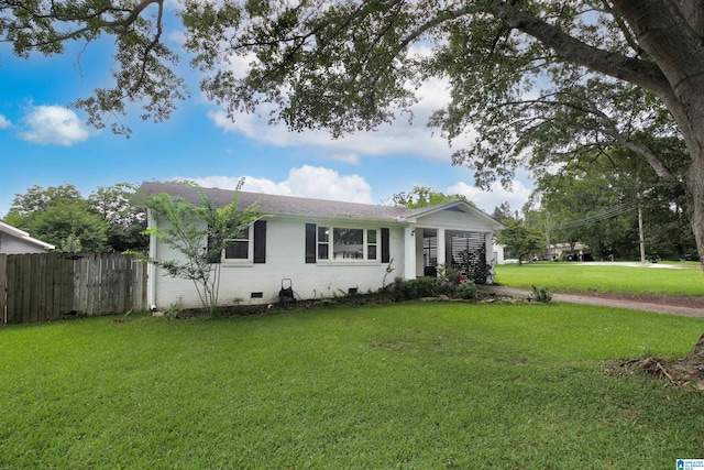 ranch-style house with a front lawn