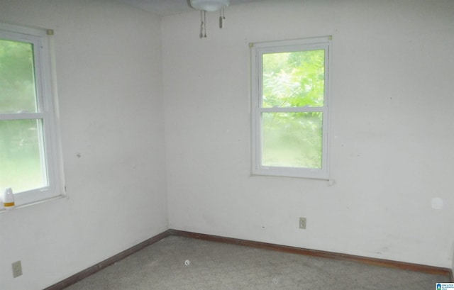 spare room featuring a wealth of natural light