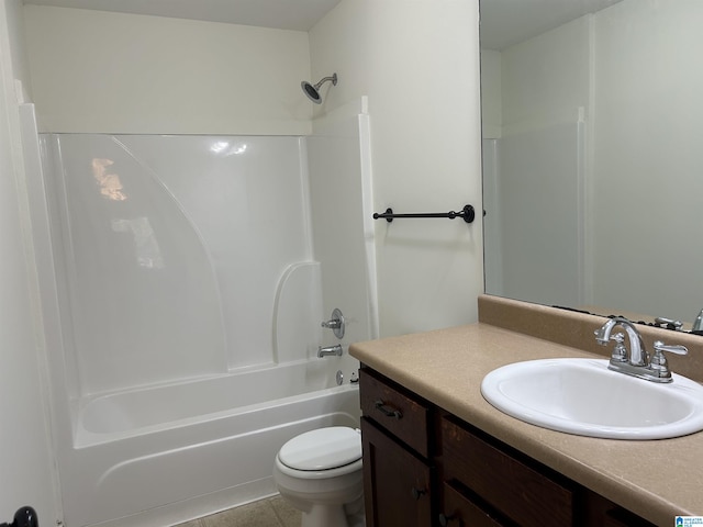 full bathroom with shower / bathing tub combination, vanity, tile patterned floors, and toilet