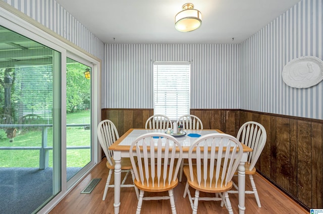 dining area featuring wood-type flooring