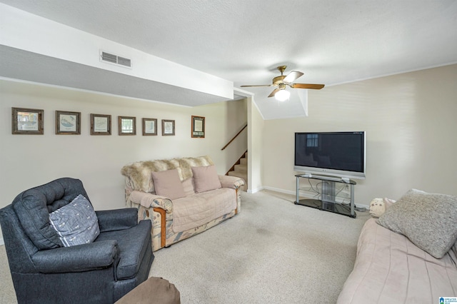 living room with light colored carpet and ceiling fan