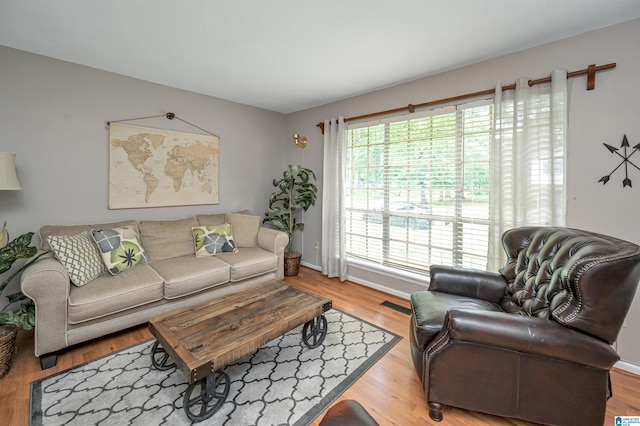 living room with light hardwood / wood-style floors